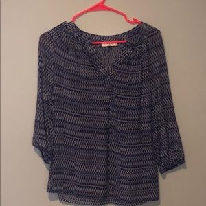 Woman’s party blue and white blouse